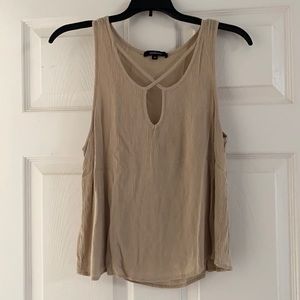 Light brown sleeveless shirt, size S